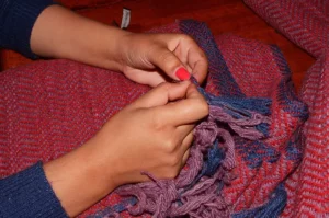 Hand Knotting in the shop of Himalayan Weavers Rajpur